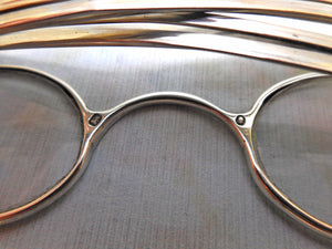 A shagreen spectacle case fitted with silver eye glasses. HM 1812.