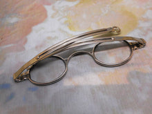 Load image into Gallery viewer, A shagreen spectacle case fitted with silver eye glasses. HM 1812.
