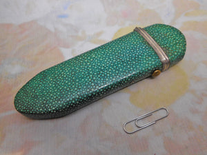 A shagreen spectacle case fitted with silver eye glasses. HM 1812.