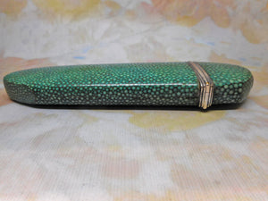 A shagreen spectacle case fitted with silver eye glasses. HM 1812.