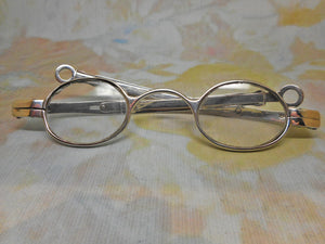 A shagreen spectacle case fitted with silver eye glasses. HM 1812.