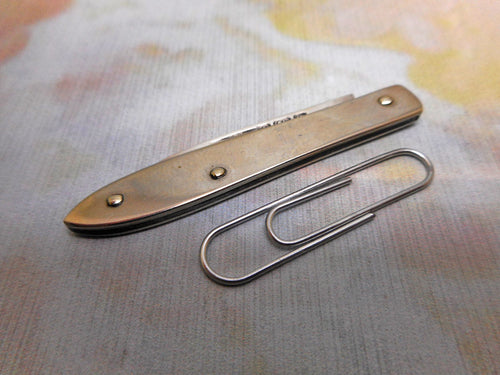 A small silver folding knife. HM. 1905