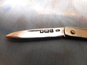 A small silver folding knife. HM. 1905