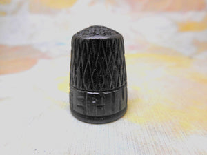 An Irish bog oak thimble. c 1880