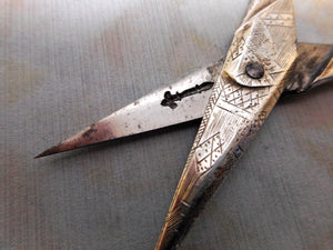 SOLD…….A pair of 18th century engraved close plated scissors. c 1780