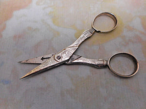 SOLD…….A pair of 18th century engraved close plated scissors. c 1780