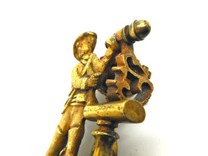 A figural hemming clamp. c1880-1900