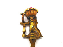 Load image into Gallery viewer, A figural hemming clamp. c1880-1900
