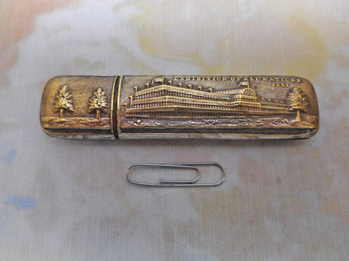 A small base metal case. ' Exhibition of All Nations 1851'
