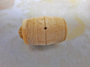 A scarce mutton bone cotton barrel. c 1800