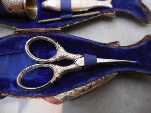 A French fish shaped etui with mini silver tools. c 1870