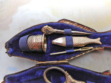 Load image into Gallery viewer, A French fish shaped etui with mini silver tools. c 1870
