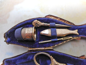 A French fish shaped etui with mini silver tools. c 1870