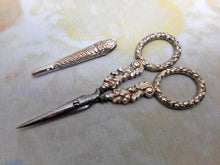 Load image into Gallery viewer, A pair of silver handled scissors. c 1830
