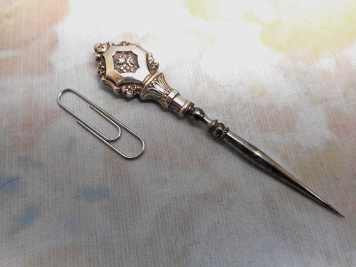 A silver stiletto / awl  from a French sewing set.  c1830