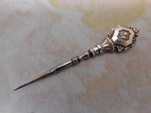 A silver stiletto / awl  from a French sewing set.  c1830