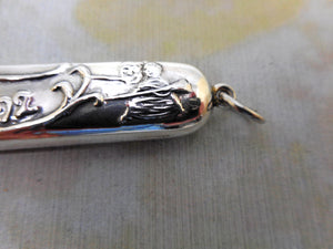 A silver pencil holder. Salem Witch Souvenir. c 1900