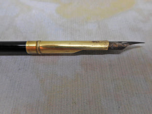 A Victorian dip pen with cross hatched seal  c 1840