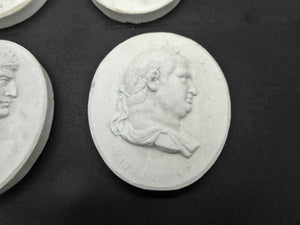 A set of Grand Tour plaster cameos of the first 12 Roman Emperors. c1830