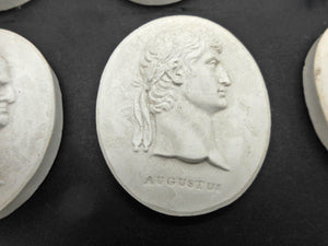 A set of Grand Tour plaster cameos of the first 12 Roman Emperors. c1830