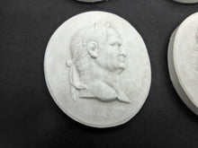 Load image into Gallery viewer, A set of Grand Tour plaster cameos of the first 12 Roman Emperors. c1830
