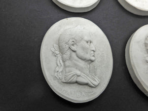 A set of Grand Tour plaster cameos of the first 12 Roman Emperors. c1830