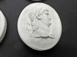 A set of Grand Tour plaster cameos of the first 12 Roman Emperors. c1830