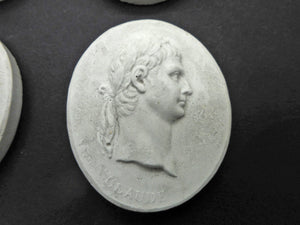 A set of Grand Tour plaster cameos of the first 12 Roman Emperors. c1830