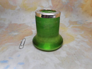 An unusual green glass match holder. HM 1911.