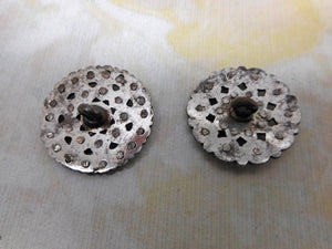 Two cut steel buttons. Early 19th century.