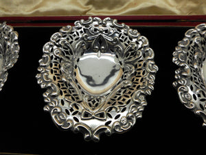 A set of three silver bonbon dishes. HM. 1895