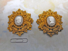 Load image into Gallery viewer, A good looking pair of bracelet buckles set with classical cameos. c1830-1840
