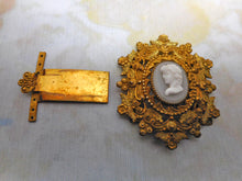 Load image into Gallery viewer, A good looking pair of bracelet buckles set with classical cameos. c1830-1840
