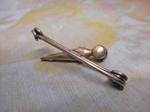 A mini Scottish dirk silver brooch. c1900-1920