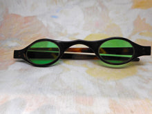 Load image into Gallery viewer, A pair of tortoiseshell spectacles with green tinted lenses. c 1800
