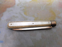 Load image into Gallery viewer, A fine mother of pearl and silver folding fruit knife. HM. 1848.
