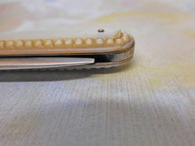 Load image into Gallery viewer, A fine mother of pearl and silver folding fruit knife. HM. 1848.
