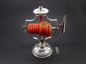 A Mappin & Webb silver plated wax jack. c1880