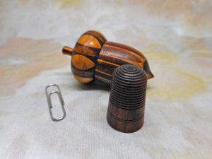 A Tunbridge Ware acorn shaped thimble case and thimble. c 1870