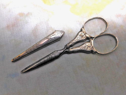 A small pair of engraved silver scissors. c1830