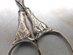 A small pair of engraved silver scissors. c1830