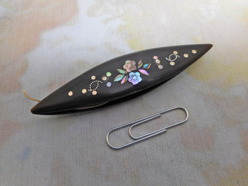 A horn pique tatting shuttle. c 1860.