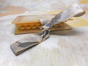 An engraved mother of pearl needle case in the form of a book. c 1850