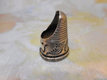 Load image into Gallery viewer, An engraved silver finger guard / thimble. Mid 19th century.
