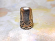 Load image into Gallery viewer, An engraved silver finger guard / thimble. Mid 19th century.
