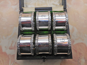 A set of 6 Mappin & Webb silver plated napkin rings. c1900