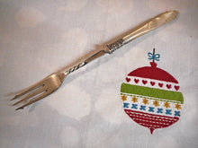 Load image into Gallery viewer, A mother of pearl pickle fork. HM silver band Sheffield 1894.
