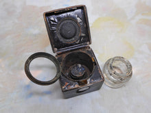 Load image into Gallery viewer, A silver mounted leather inkwell from a dressing box. London 1864 JV James Vickery
