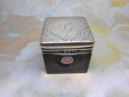 A silver mounted leather ink well from a dressing box. London 1864 JV James Vickery