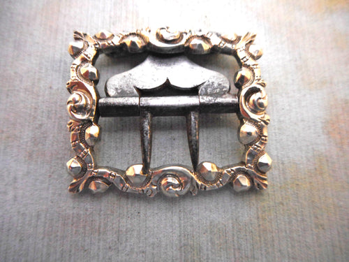 A small 18th century silver buckle. Maker IG.